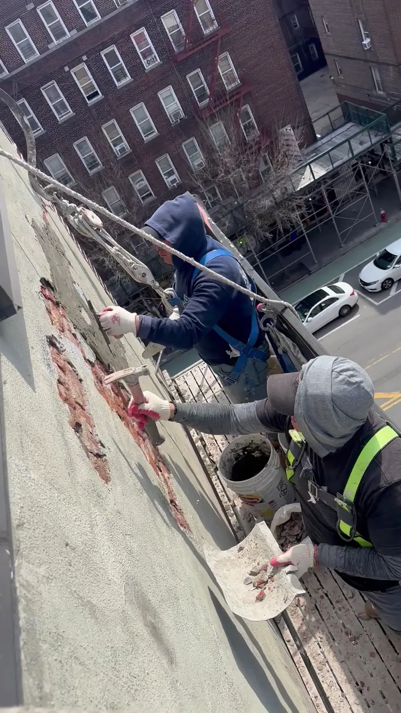Best Valana masons repairing a building facade in New York City
