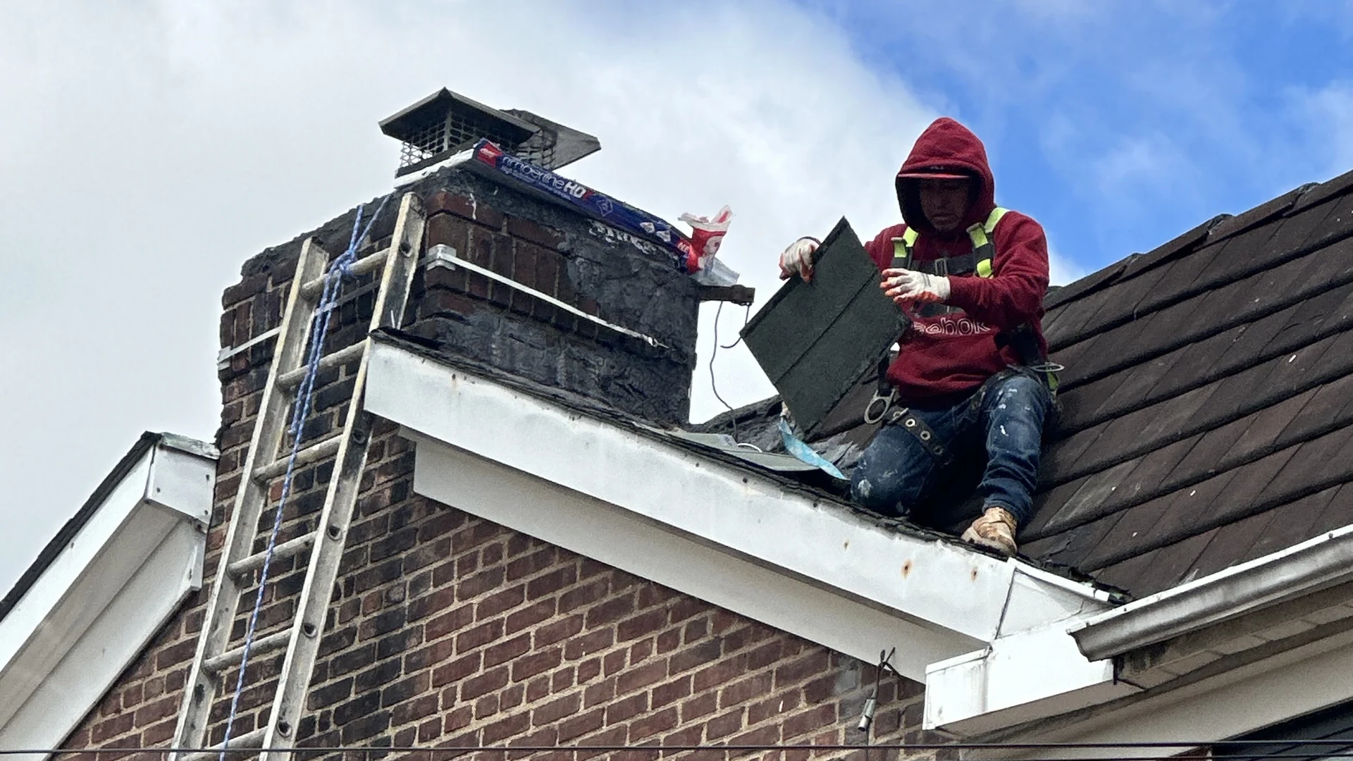 Best Valana roofer replacing slate on a pitched roof in New York City